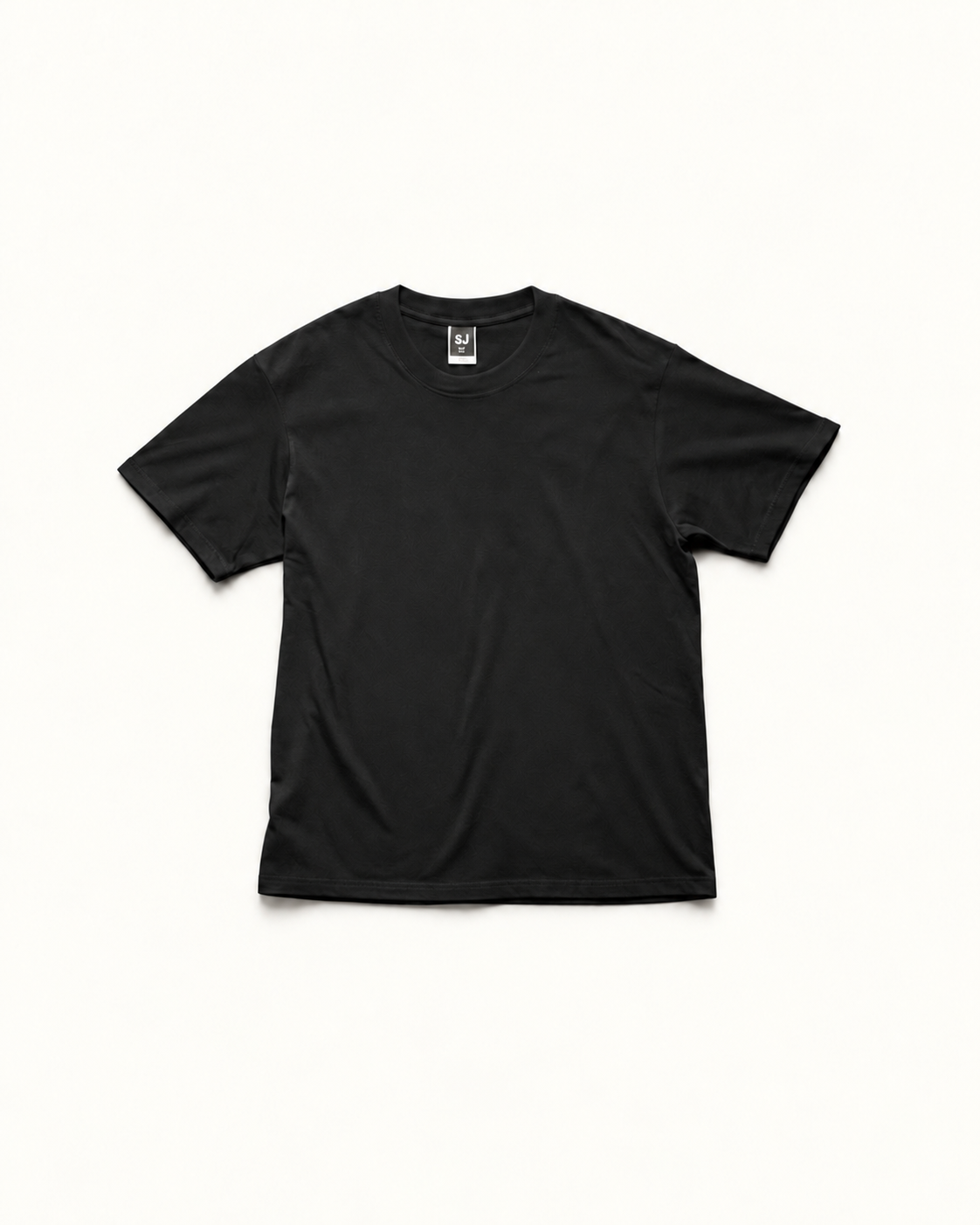Black SJ Goods Tee — front; refined warm-neutral product presentation