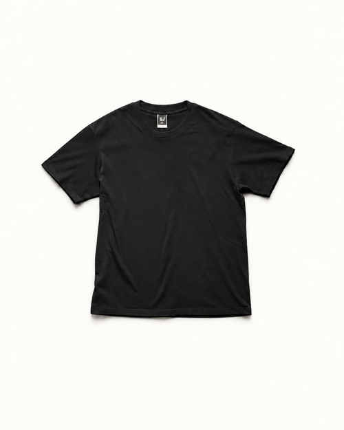 Black SJ Goods Tee — front; refined warm-neutral product presentation