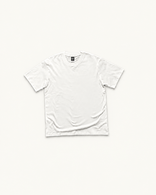White SJ Goods Tee — front; refined warm-neutral product presentation